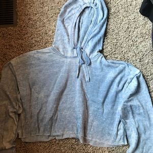 Light blue cropped hoodie.